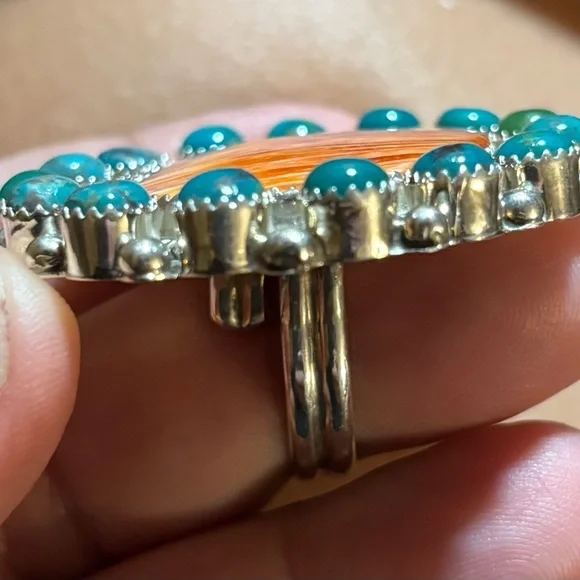 Beautiful Native American made sterling silver,turquoise, coral adjustable ring